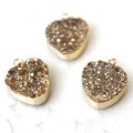 ドゥルージー　かどまるさんかくパーツ(シャンパンゴールド)　1.2ｃｍ×1.2ｃｍ　　品番： 7373