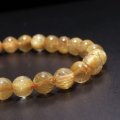 ブレス　ルチルクォーツ＜ブラジル産＞　丸　約7mm　金運　財運　ギャンブル運　パワーストーン　天然石　品番：18050